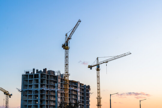 Picture of buildings under construction with construction crane