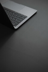Grey laptop on Grey background - obrazy, fototapety, plakaty