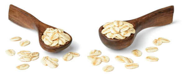 uncooked oatmeal in the wooden spoon, isolated on white