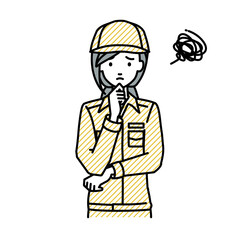 立って手をあごにあてて困っている作業員の女性