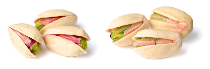 unpeeled pistachios isolated on the white background