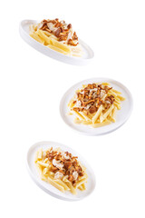 Chanterelle onion fried creamy pasta on a white isolated background