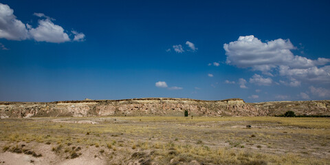 Cappadocia, Turkey - September 1, 2021 – Impressive nature by chimney rock formations and rock pillars of “love Valley” near Goreme, Cappadocia, Nevsehir, Turkey