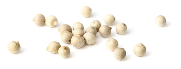 close up of dried white peppercorns isolated on the white background, top view