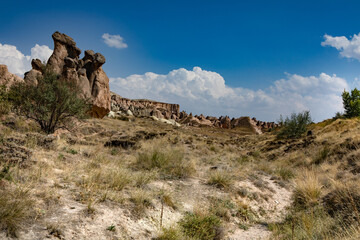 Cappadocia, Turkey - September 1, 2021 – Impressive nature by chimney rock formations and rock...