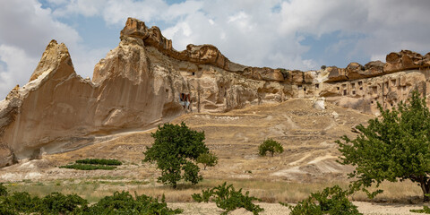 Cappadocia, Turkey - September 1, 2021 – Impressive ancient cave home which had been carved in...