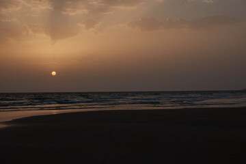 Obraz premium sunset on the beach of El Palmar, in Vejer de la Frontera. Cadiz. Andalusia. Spain