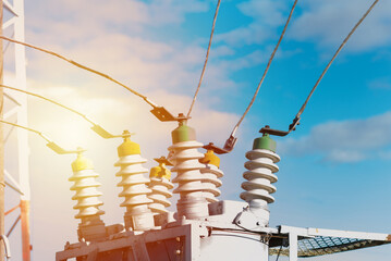 High voltage electric generator insulators.Detail of high voltage circuit breaker in a power...