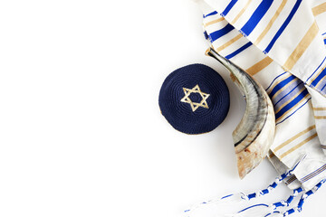 Yom kippur, Rosh hashanah, jewish New Year holiday, concept. Religion image of shofar - horn on white prayer talit. - obrazy, fototapety, plakaty