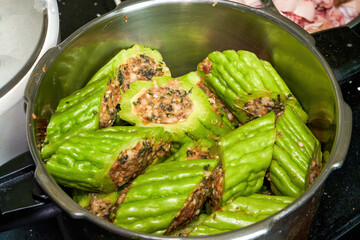 Chinese Guangxi traditional dish, bitter gourd stuffed with meat close-up