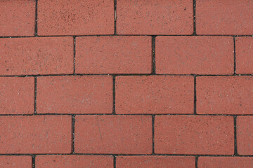 Fototapeta premium Red brick wall. Wall texture, background. Stock photo for wallpaper or texture