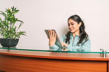 Portrait of a woman working at a reception