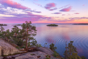 Purple sunset over Lake Ladoga. - 457157447
