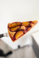 a piece of delicious plum pie