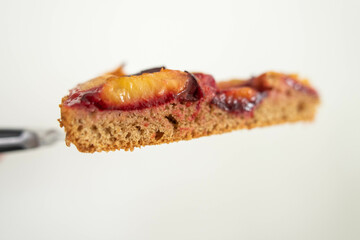 a piece of delicious plum pie