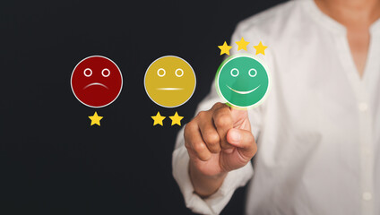 Customer feedback, service evaluation, and satisfaction conceptual. Business people pressing smiley face emoticon on the virtual touch screen