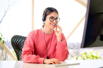Shot of call center agent operator businesswoman working from home