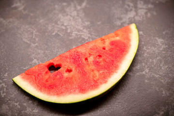 Fototapeta na wymiar a slice of watermelon with a heart-shaped hole