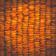 The process of home cooking dried fruits in an electric dryer.