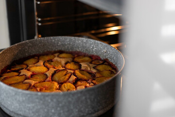 plum pie is cooked in the oven