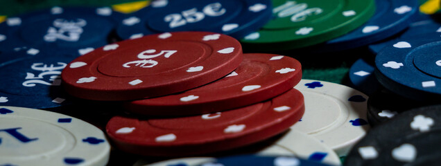banner poker card game chips on a green table