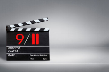 Patriot Day 9 11. handwriting on film slate or movie clapper board.Storytelling concept.
