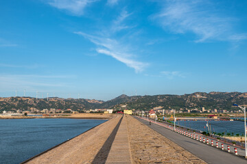 Obraz premium The dyke of the sea under the blue sky