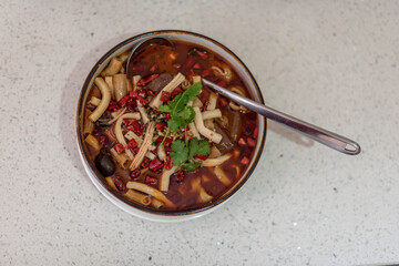 The Chinese food on the plate is beautiful and delicious