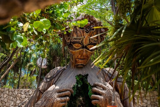 Tulum, Mexico. May 25, 2021. Ven a La luz sculpture installed at the beautiful resort Ahau next to a sign of cafe
