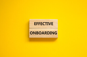 Effective onboarding symbol. Wooden blocks with words Effective onboarding on beautiful yellow background. Business, HR and effective onboarding concept. Copy space.
