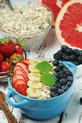 Healthy diet breakfast including cereal with berry and fruits