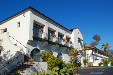Historic Spanish Colonial style residence building near Santa Barbara County Courthouse in historic...