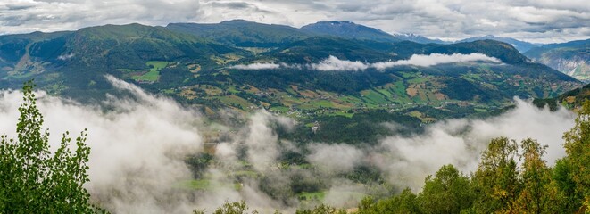 Views of foggy mountains meadows from Molden hike in Norway