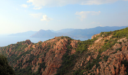 Red rocks in northeastern Corsica during sunset near the town called Piana