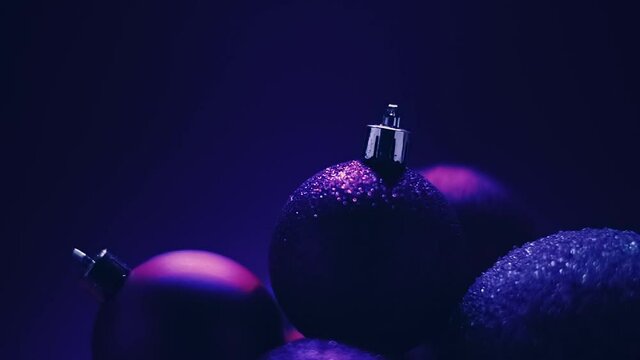 Purple Christmas holidays background, baubles as festive winter decoration. High quality FullHD footage