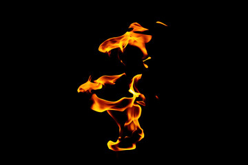 Real flames from underground gas isolated on black