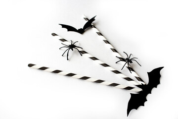 Hallowne. Bat and spiders. Halloween decor elements on white background. Decor concept for the autumn holiday. Flat layout. Selective focus. - 457179478