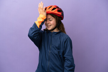 Little caucasian girl isolated on purple background has realized something and intending the solution