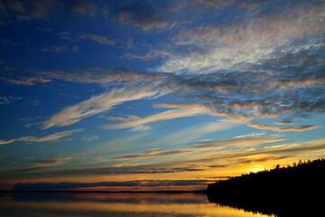View of the picturesque sunset on Lake Pongoma, North Karelia, Russia