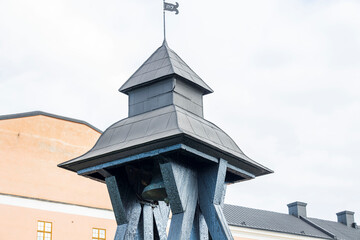 Close up view of historical bell tower in Uppsala, Sweden.