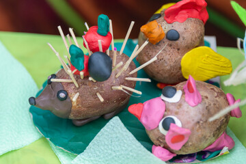 Hedgehog, pig and cockerel made from potatoes and plasticine.