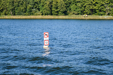 Floating sign on the lake