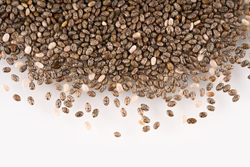 Chia seeds isolated with white background. Pile of healthy chia seeds background.