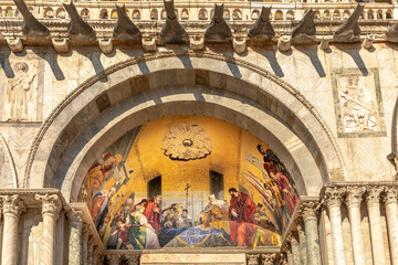 Fresco mosaic on the entrance facade of St. Mark's Basilica at St. Marks Square in Venice