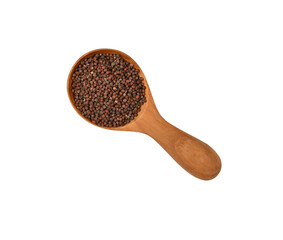 Wooden spoon of black mustard seeds