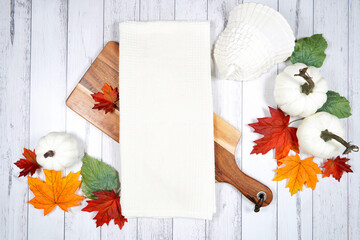 Tea towel dish cloth product mockup. Thanksgiving farmhouse theme with turkey, white pumpkins and...
