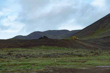 Excavator on a hill