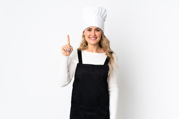 Young Brazilian chef woman isolated on white background pointing up a great idea
