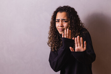 Domestic violence. Afro woman with depression, victim of torture and violence