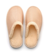 Top view of soft beige home slippers - obrazy, fototapety, plakaty